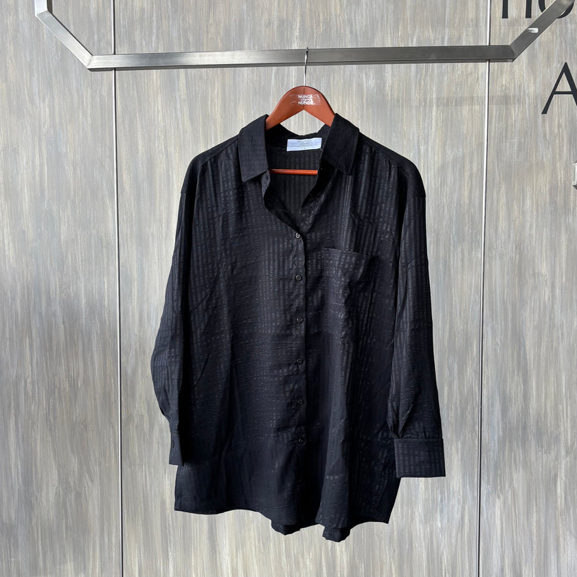 Blusa oversize manga larga