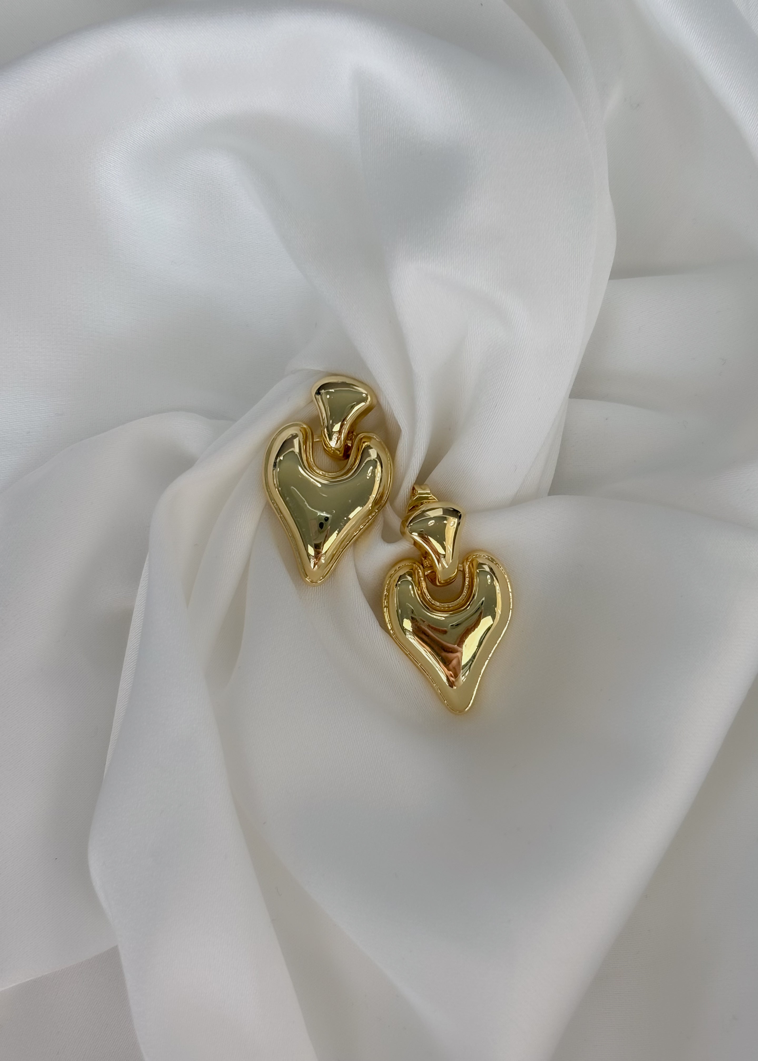 Arete corazón alargado