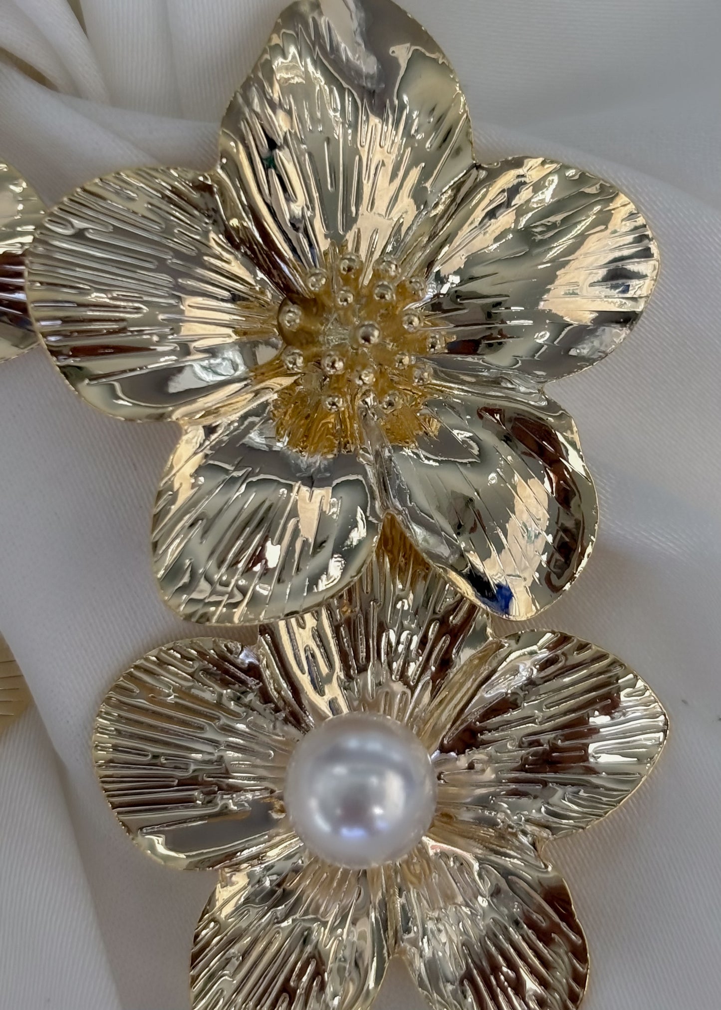 Aretes doble flor con perla