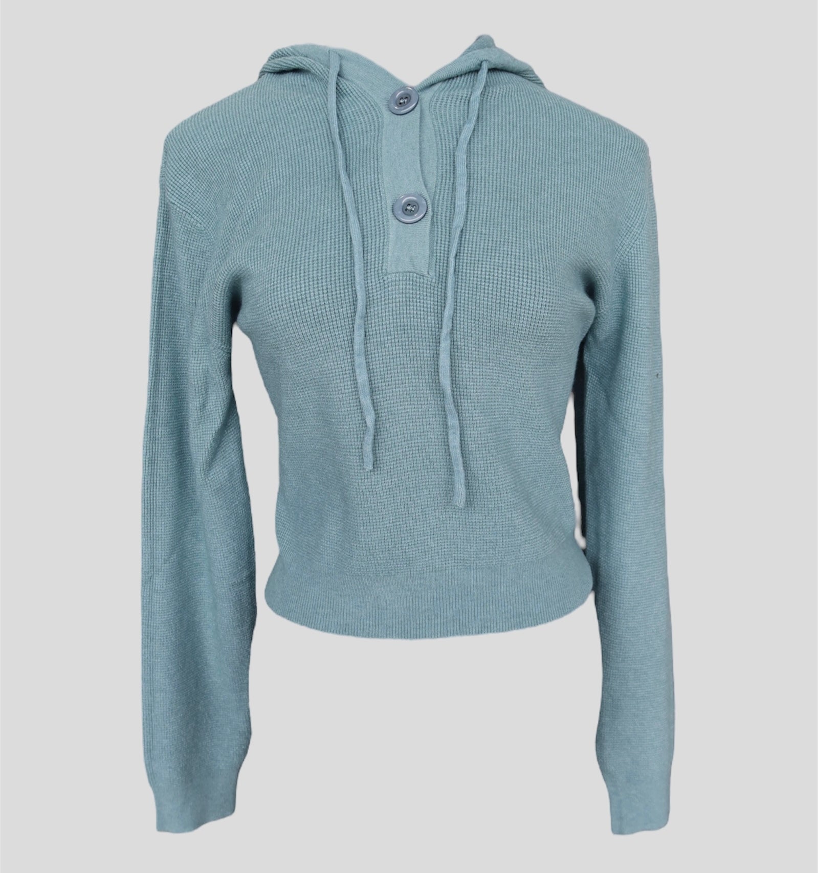 Suéter con gorra BODEGA