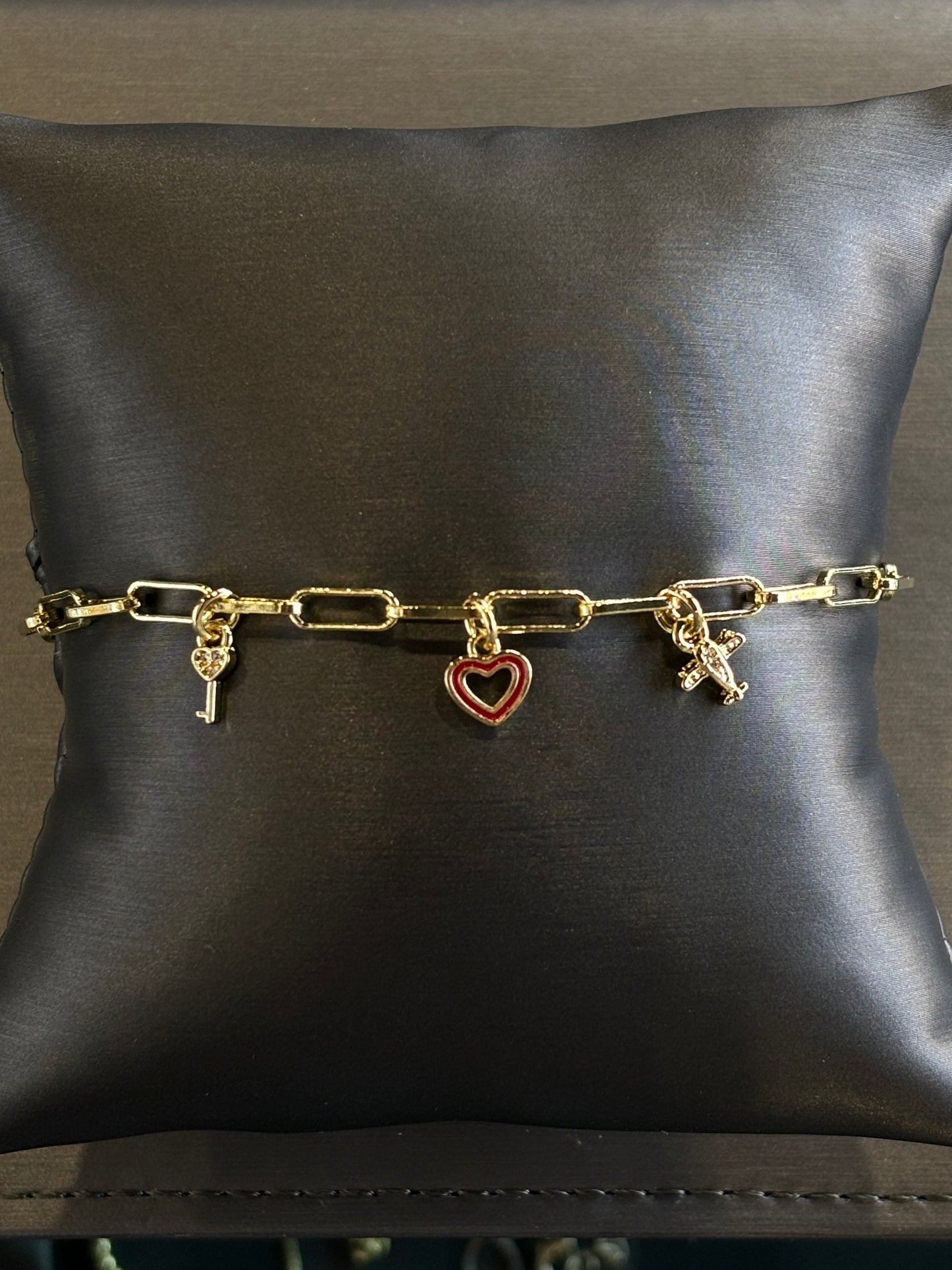 Pulsera avión corazón llave