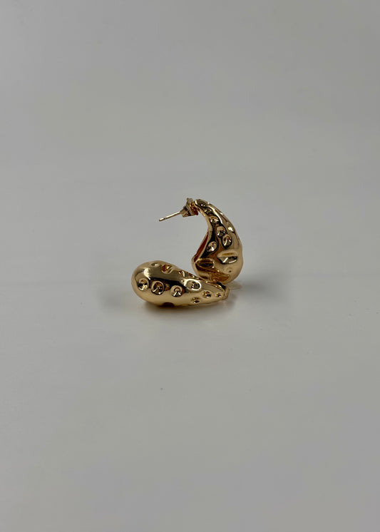 Aretes gota surco