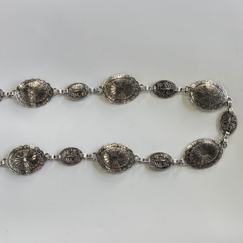 Cinturón metálico ovalos plateados