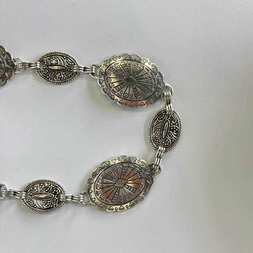 Cinturón metálico ovalos plateados