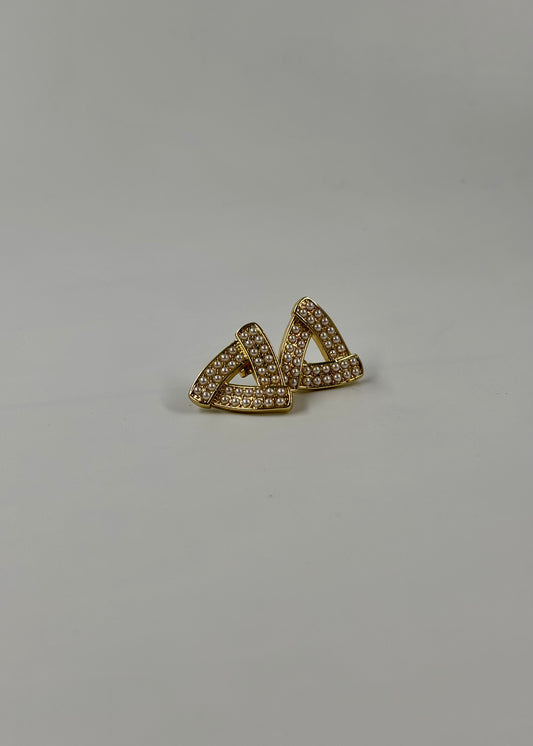 Arete triángulo con perlas