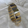 Brazalete bicolor triángulos