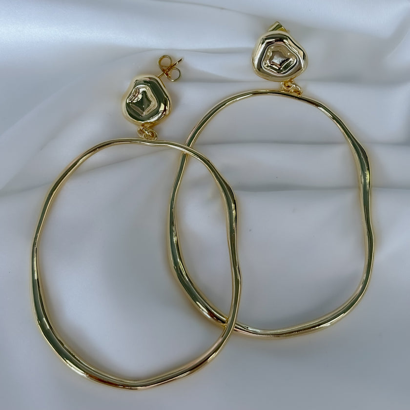 Arracadas círculo desigual