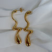 Aretes largos desiguales
