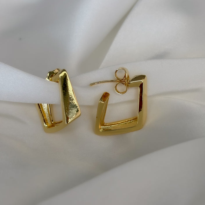 Aretes cuadro chueco