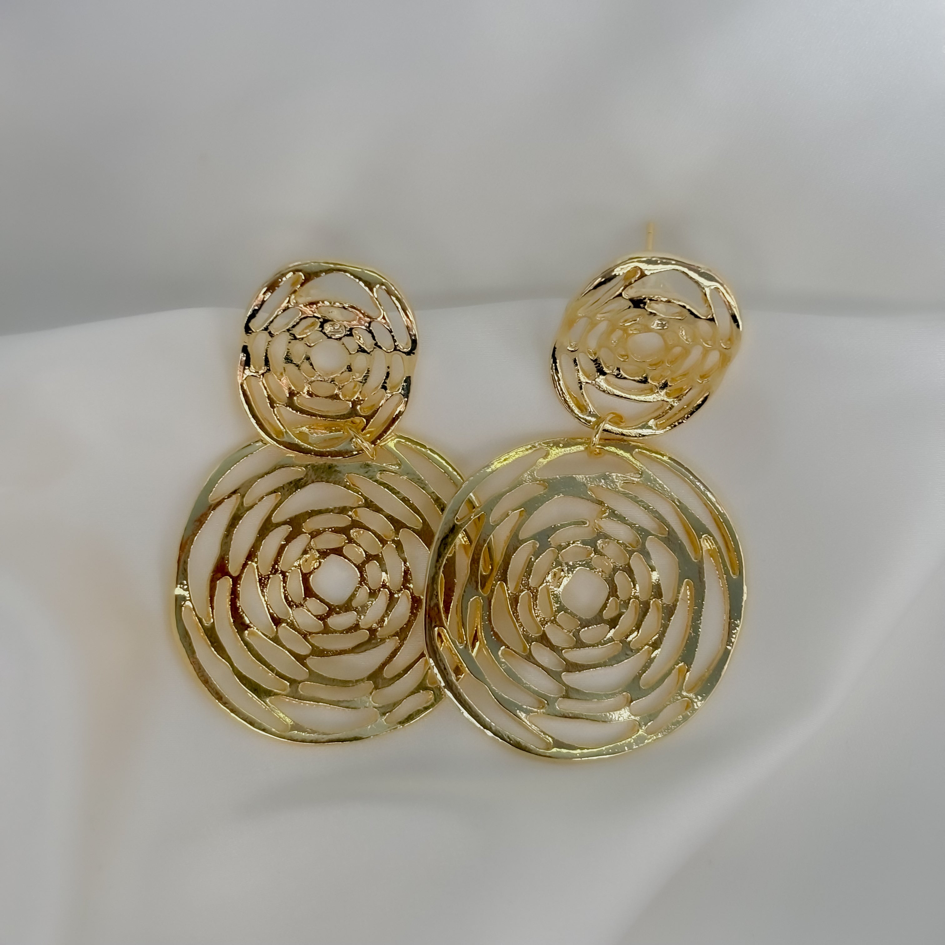 Aretes tejidos