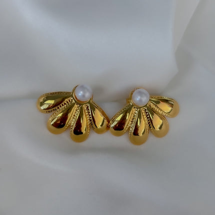 Aretes media flor