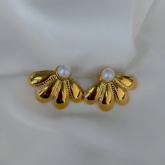 Aretes media flor