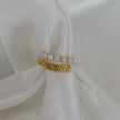 Anillo doble con perlas