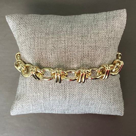 Pulsera dorada círculos cruzados