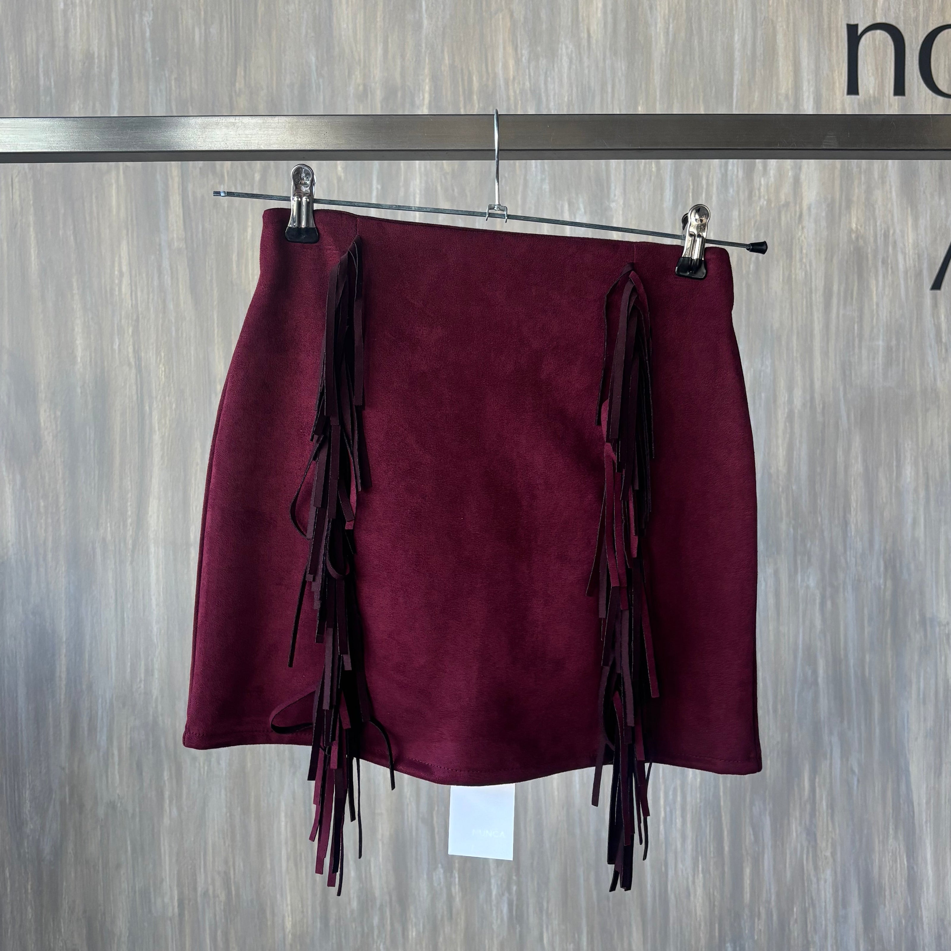 Falda ante con flecos