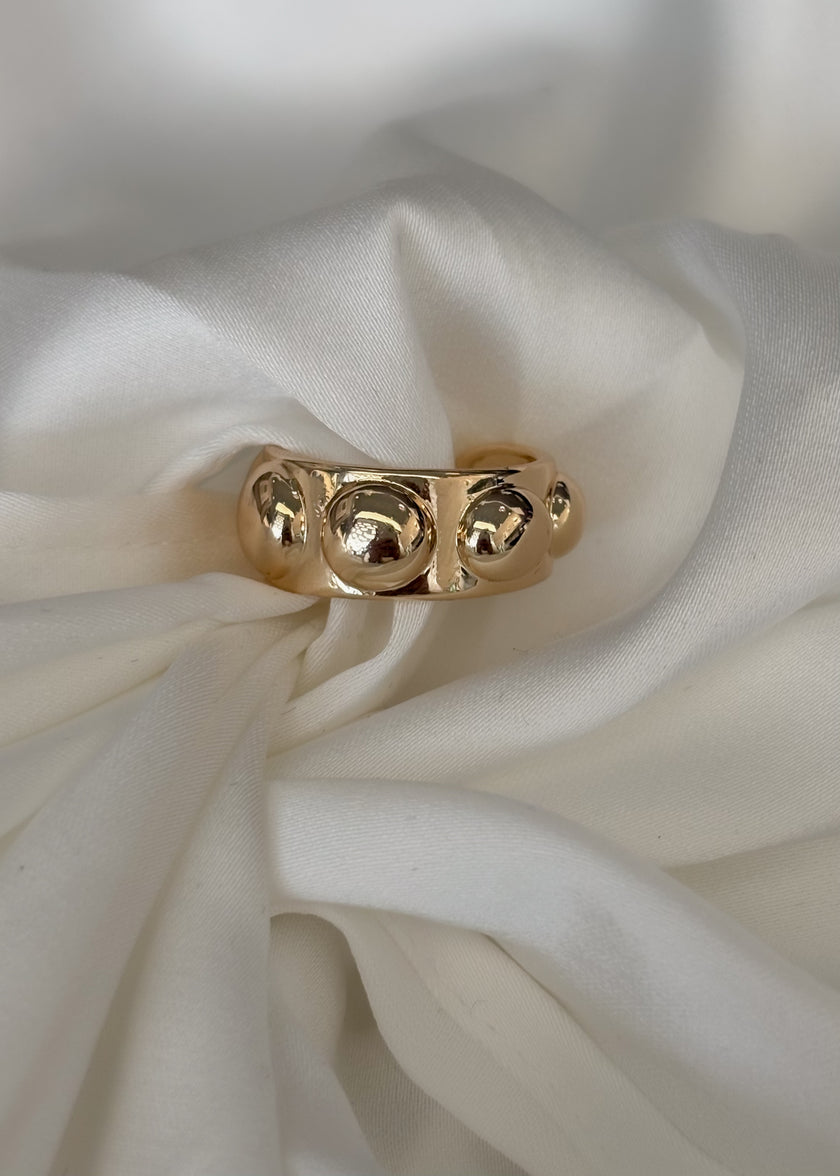 Anillo con bolitas
