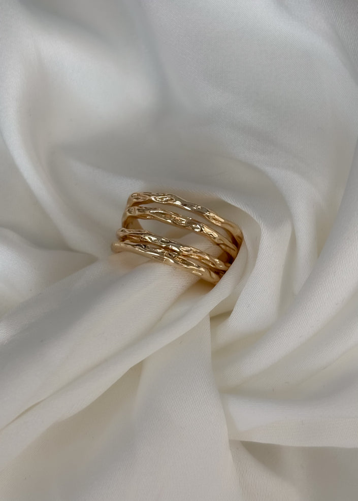 Anillo 4 líneas amartilladas