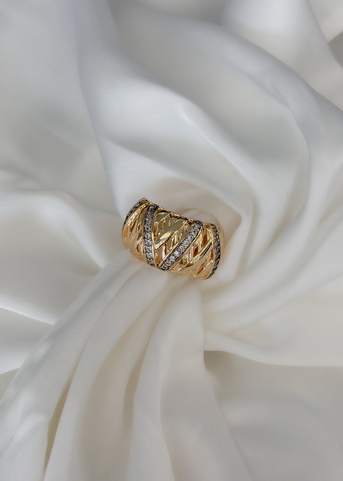 Anillo grueso tejido con brillos