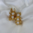 Aretes rugosos con perlas