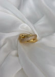 Anillo entrelazado triple con brillos