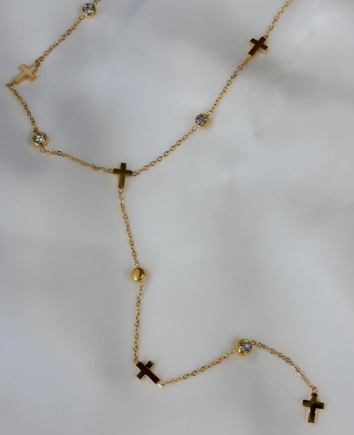 Rosario muchas cruces dorado