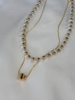Collar doble perla y figuras