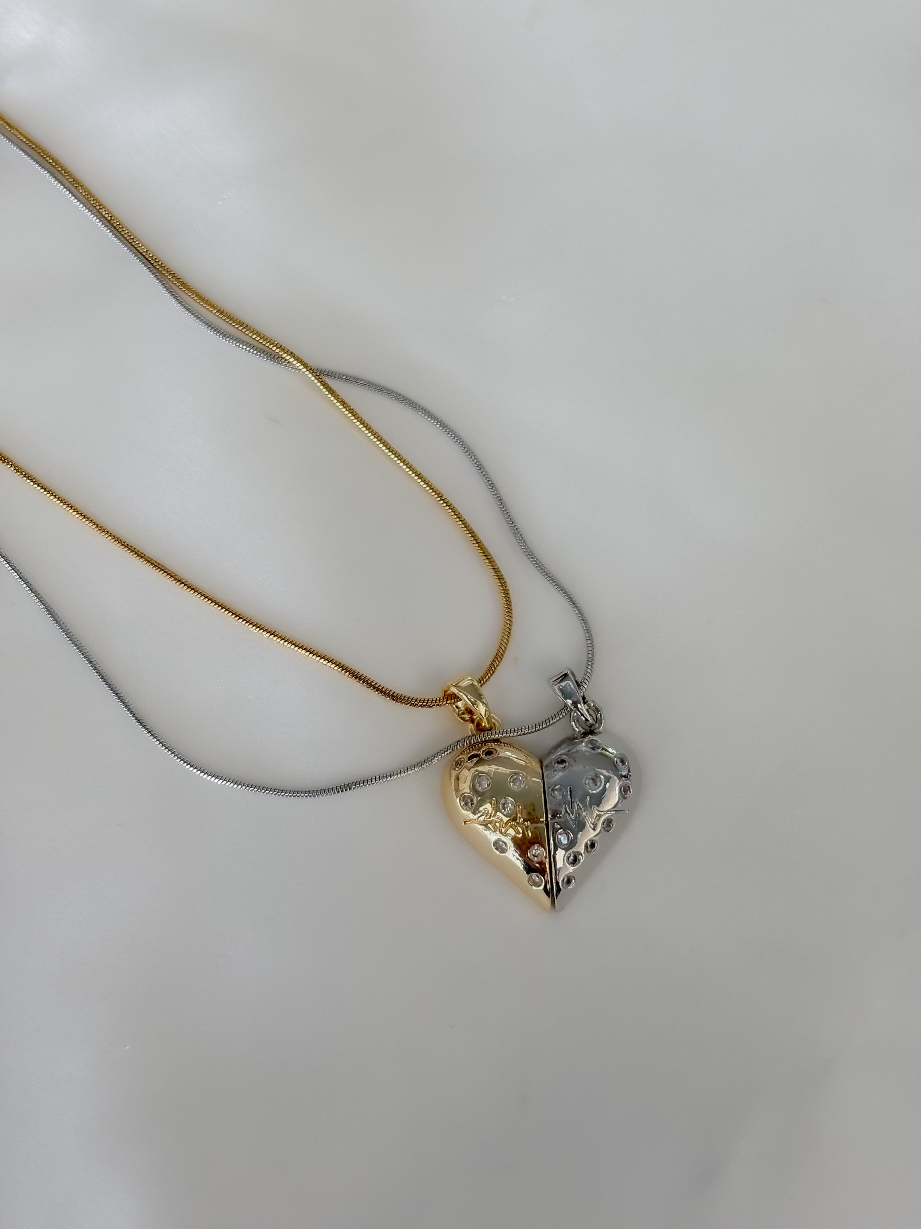 Collar doble corazon bicolor