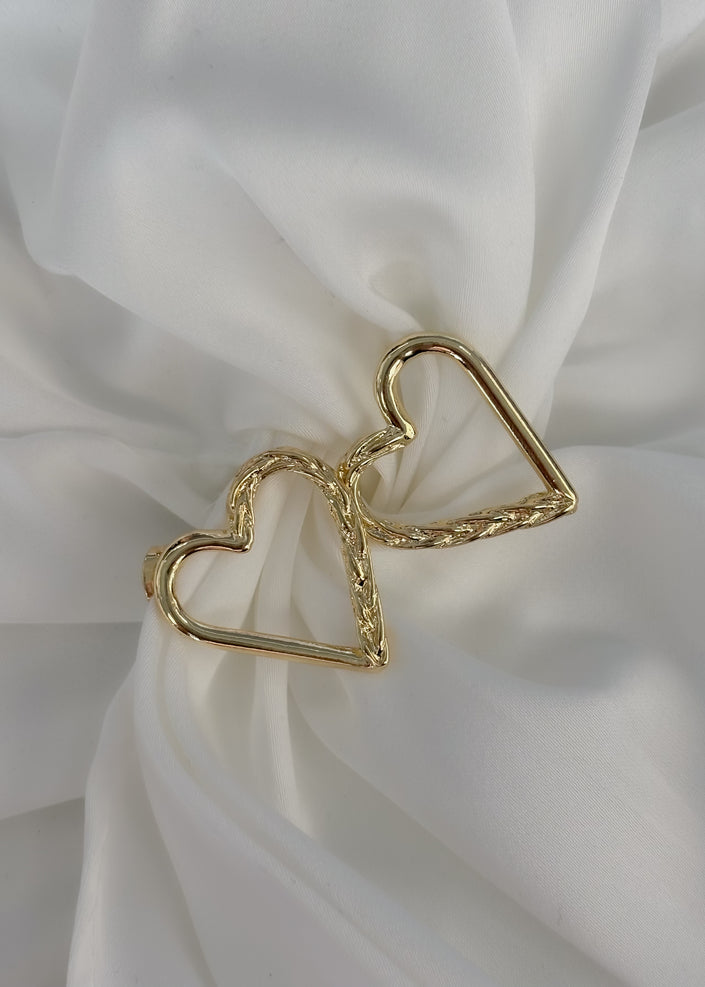 Arete mitad corazón trenzado