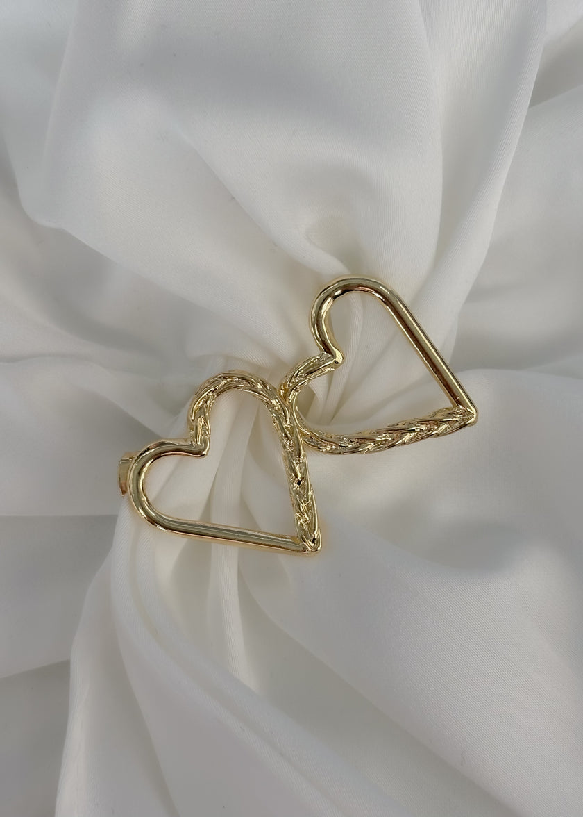 Arete mitad corazón trenzado