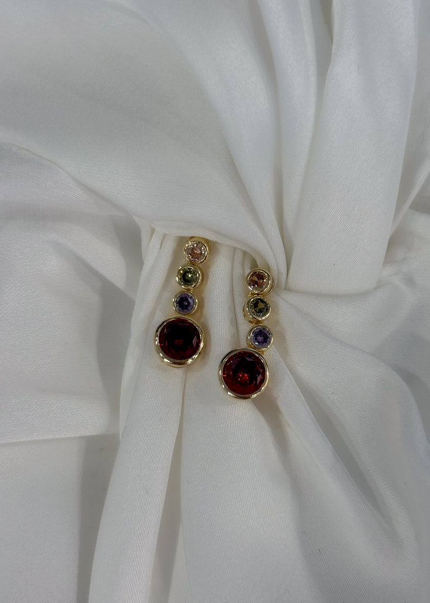 Aretes semi largos con círculos de colores