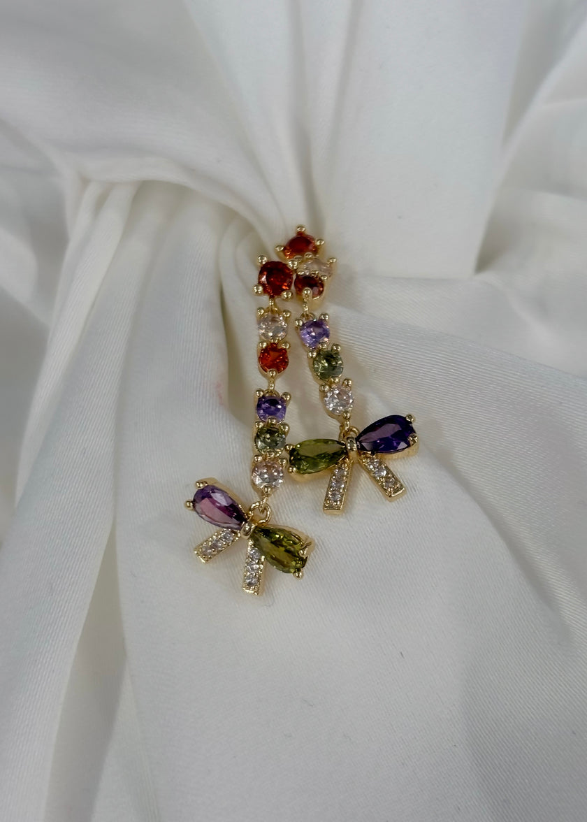 Aretes largos con moñito