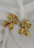 Aretes flor desigual