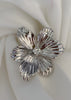 Aretes flor con brillo