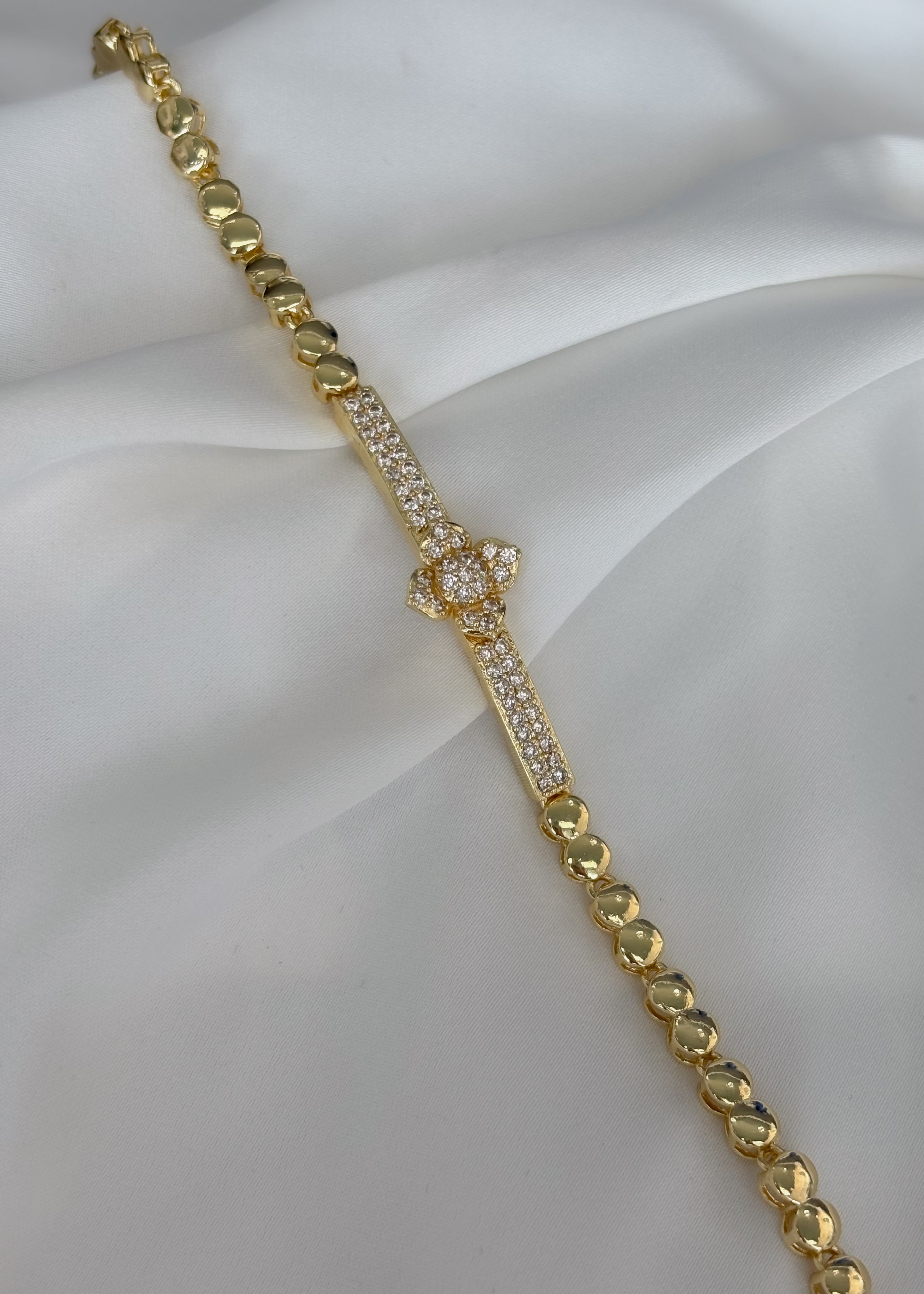 Pulsera rosa con brillos