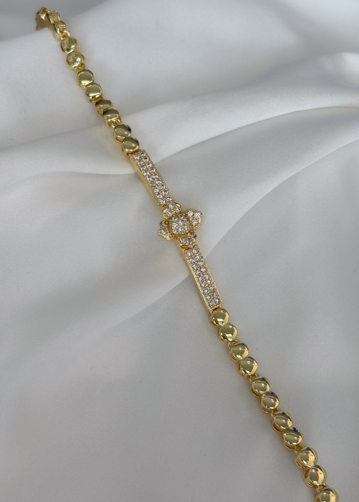 Pulsera rosa con brillos
