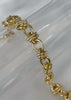 Pulsera dorada círculos cruzados