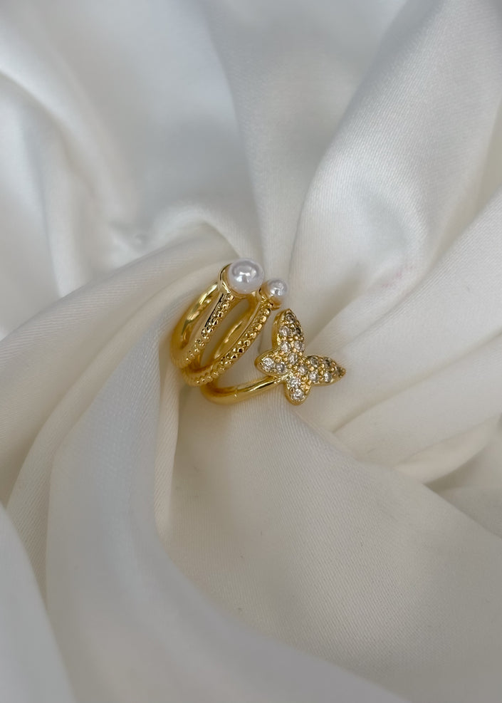 Earcuff mariposa con perlas