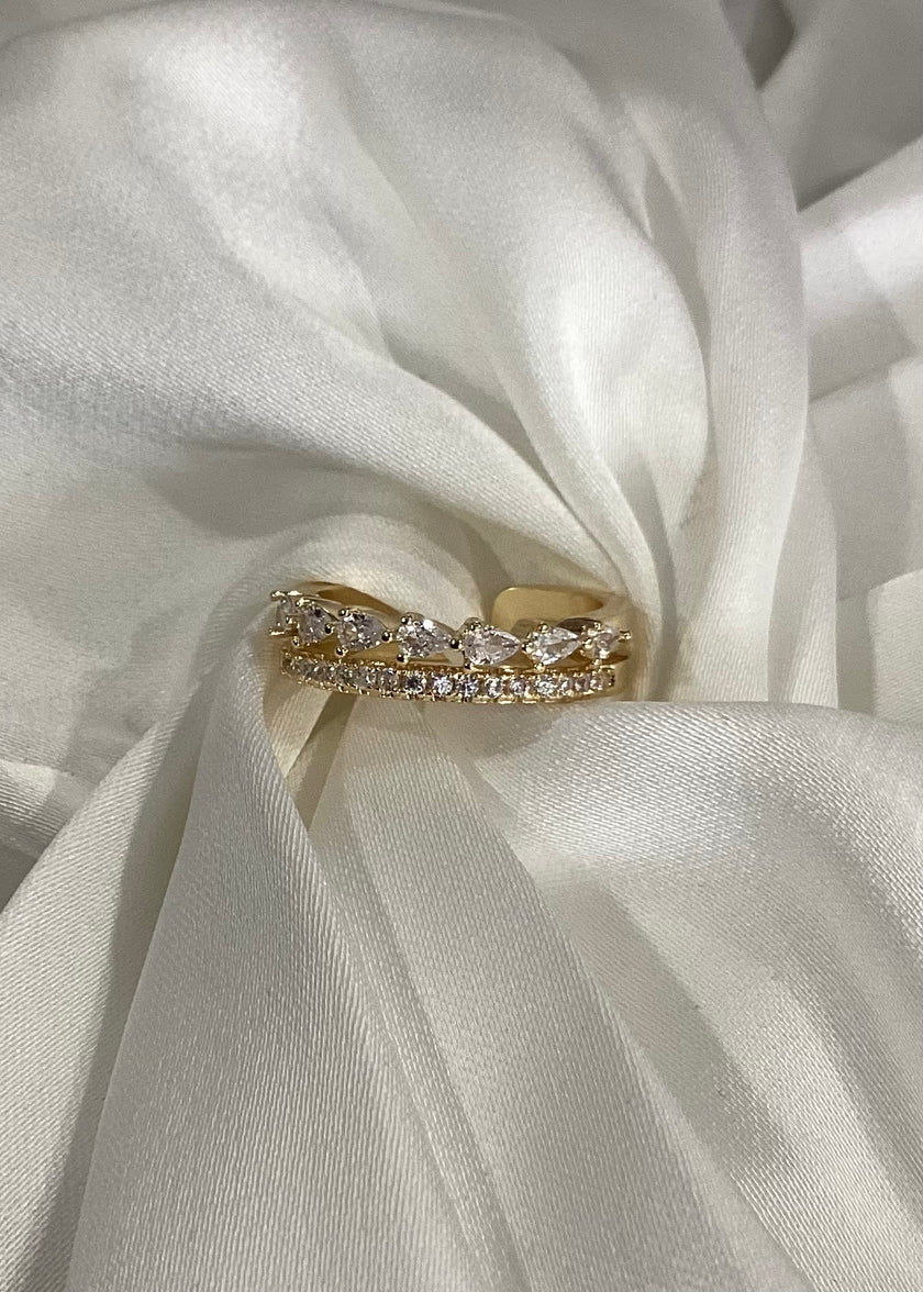 Anillo doble con zirconias superiores y brillos inferiores