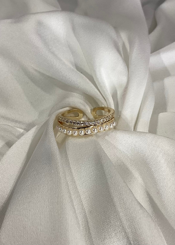 Anillo doble ondulado con perlas