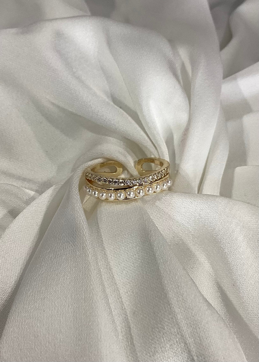 Anillo doble ondulado con perlas