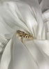 Anillo enlazado baguette mitad torcido