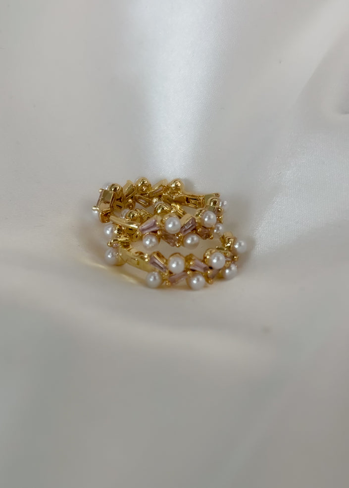 Arracada perla y brillitos rosas