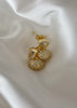 Arete brillo con colgante ovalado