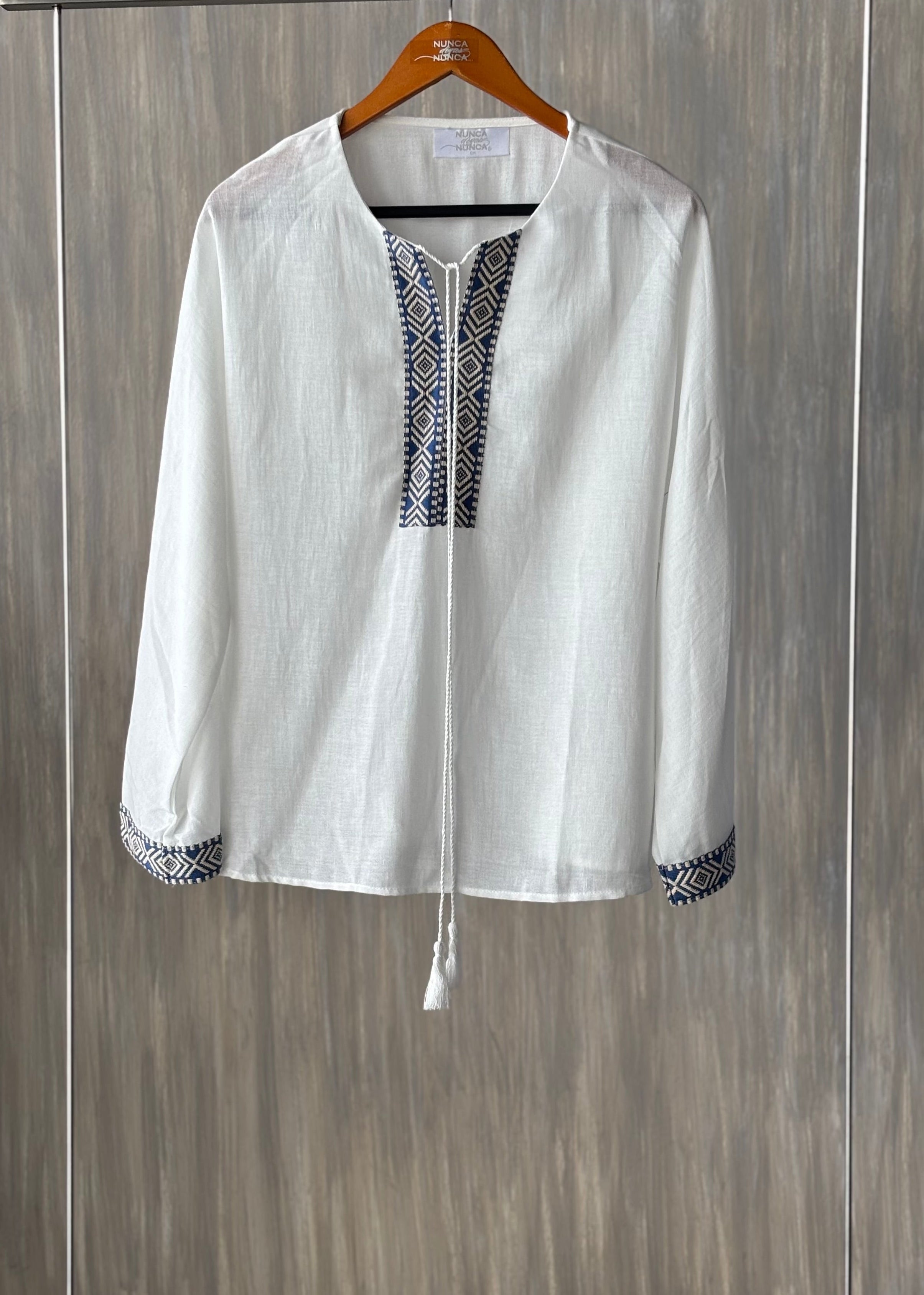 Blusa con tejido V