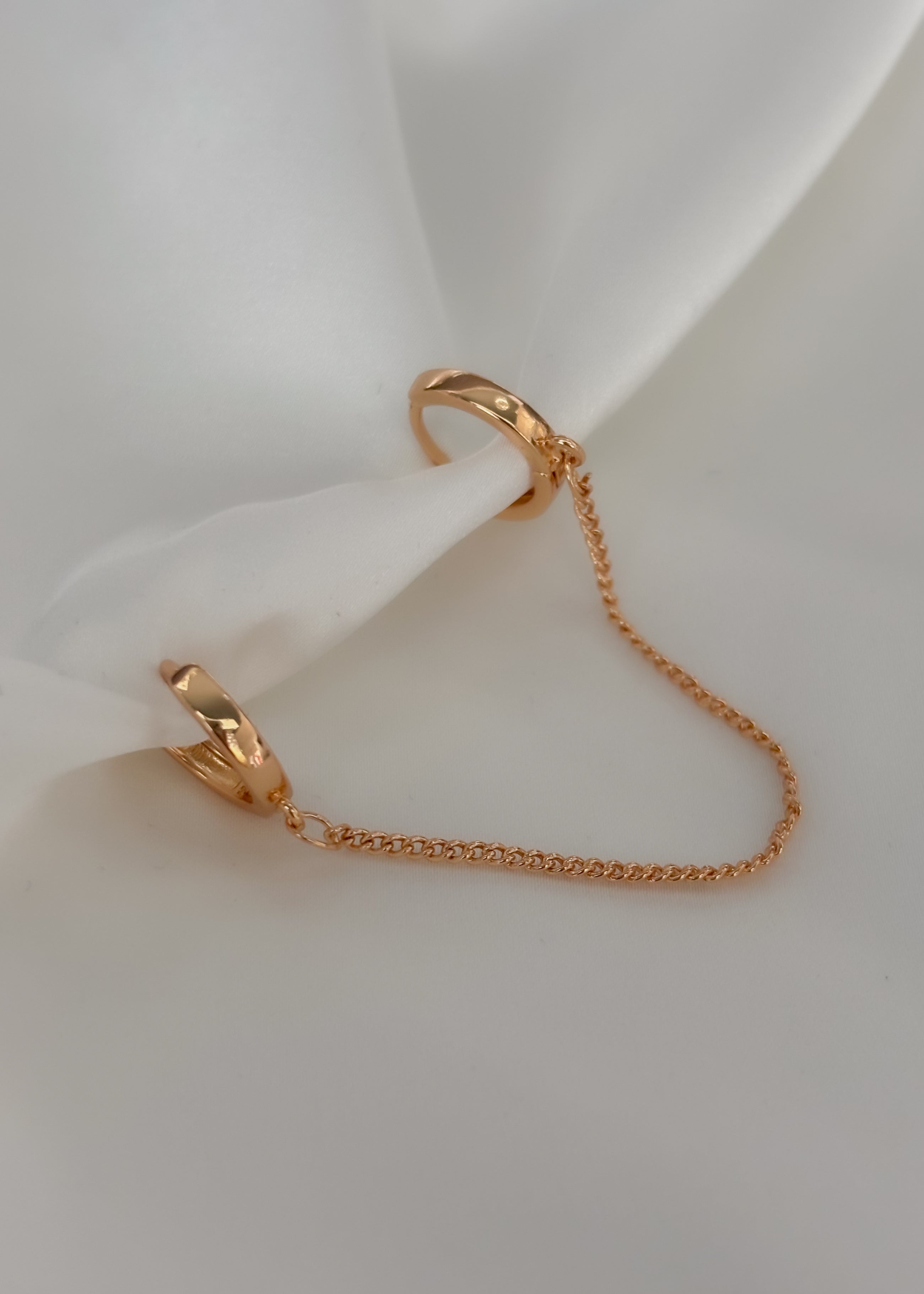Arracada doble con cadena