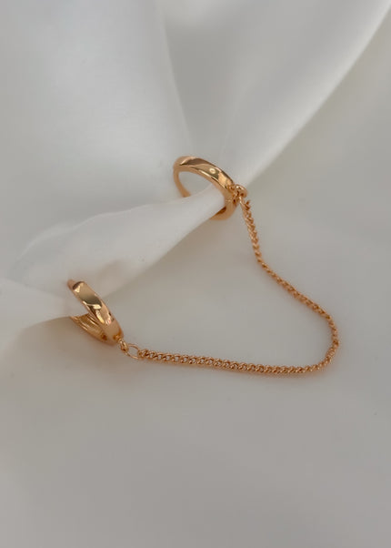 Arracada doble con cadena
