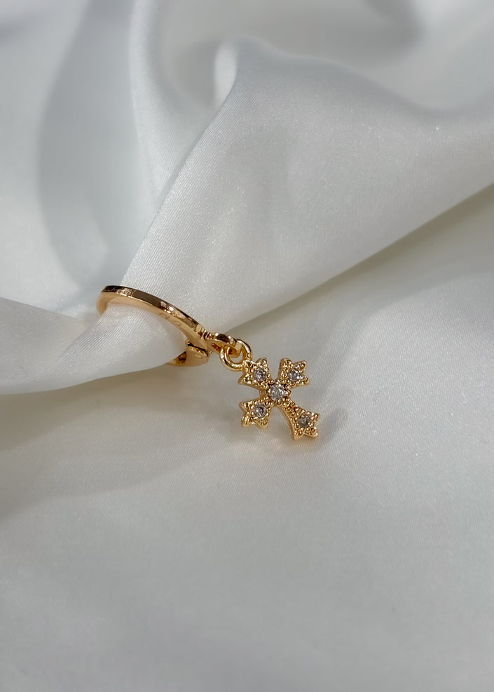 Arracada con cruz y brillos