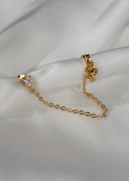 Arracada larga corazones brillo