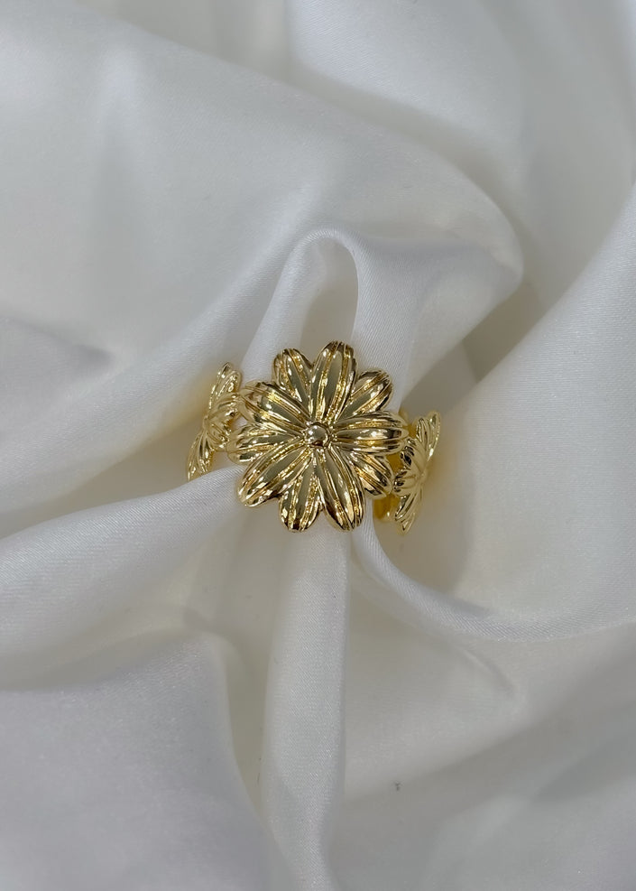 Anillo flores dorado