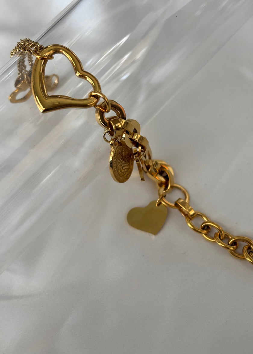 Pulsera San benito con corazones